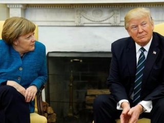 Trump Merkel'in elini niye sıkmadığını açıkladı!