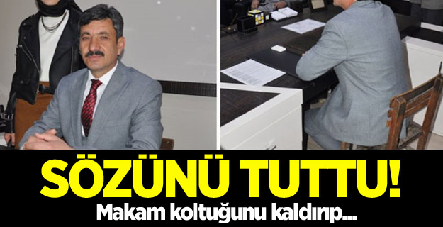 Makam koltuğunu kaldırıp tahta sandalyeye oturdu
