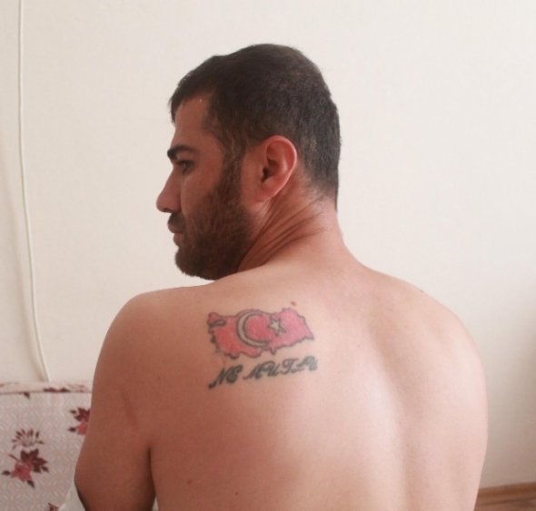 turk-bayragi-dovmesi-yuzunden-kacirilip-iskenceye-8793194_2105_m.jpg turk-bayragi-dovmesi-yuzunden-kacirilip-iskenceye-8793194_2105_m.jpg